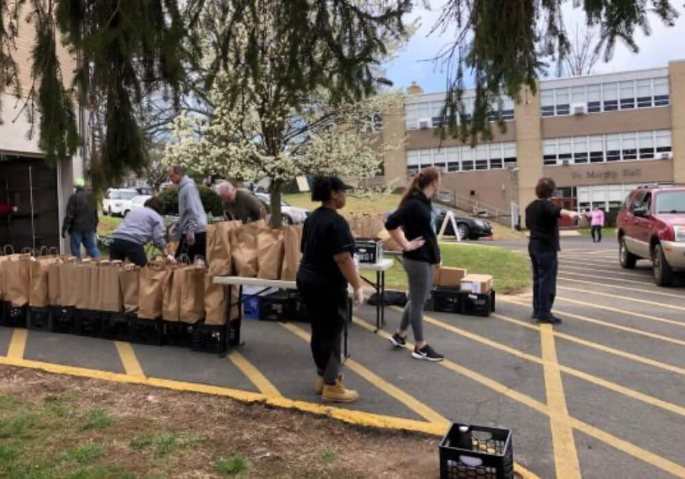 Volunteers helping to gather food for the Coronavirus Relief Fund